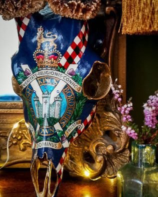 roebuck skull with military emblem KOSB