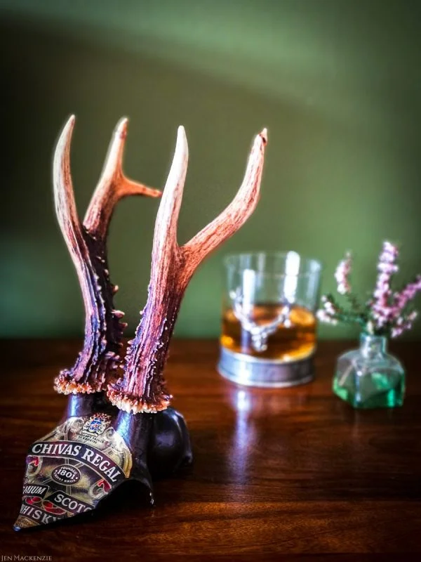 A beautiful Chivas Regal original whisky label decoupaged onto a set of stunning real roebuck antlers. Perfect for a whisky collector!