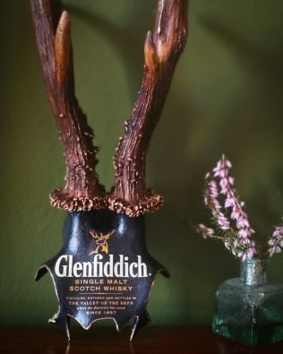 A stunning Glenfiddich 12 whisky label decoupaged onto roebuck antlers. Perfect for whisky lovers!