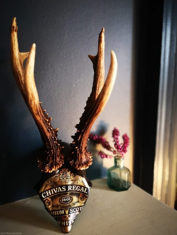 A beautiful Chivas Regal whisky label decoupaged on to stunning real antler decor. Perfect for a whisky collector.